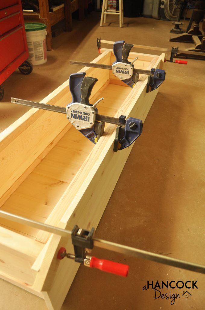 Clamps holding top on bench seat footboard